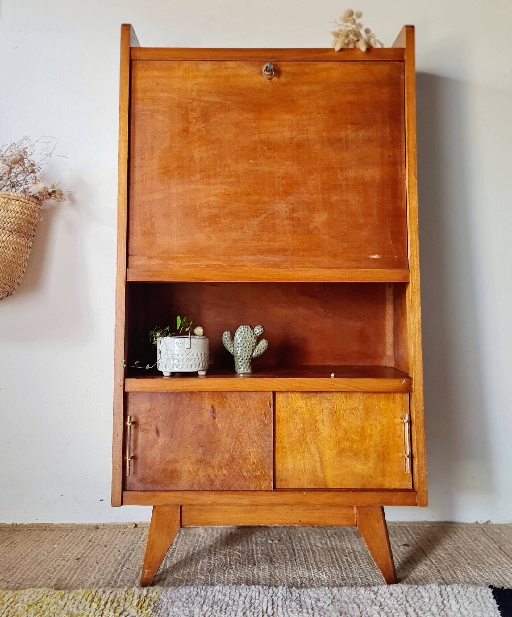 Vintage 1950s wooden secretary with tapered legs and mint interior.