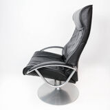 Fauteuil avec tabouret recouvert de cuir noir de design danois, années 1970