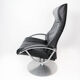 Easy chair with stool upholstered with black leather of Danish design, 1970s