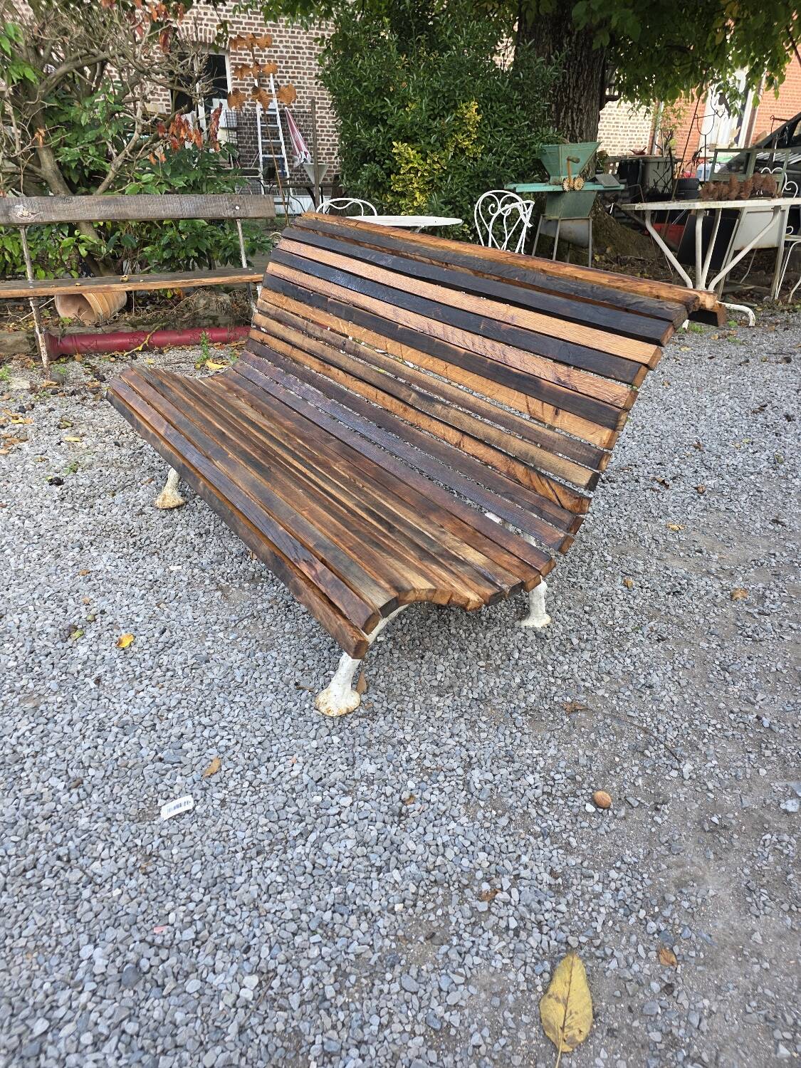 Cast iron and oak slatted garden bench