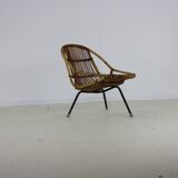 Three legged dutch design rattan easy chair by D. van Sliedregt