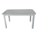 Glossy white table for dining room with white metal legs, in very good condition.