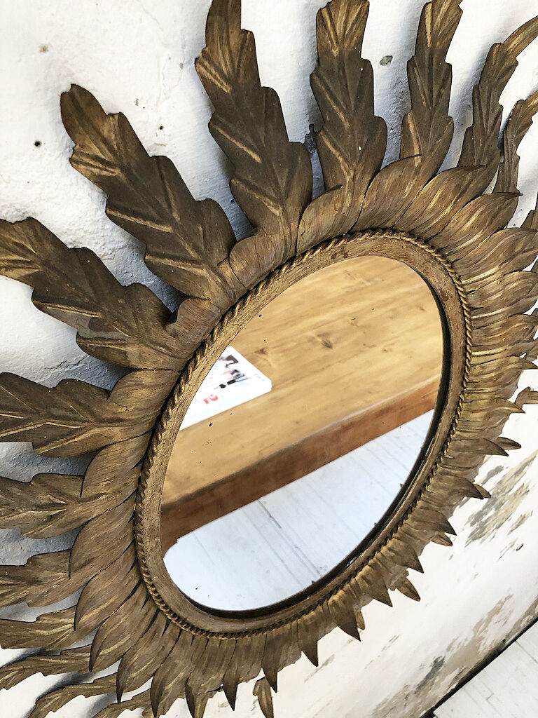 Golden mirror ancient flowery sun