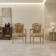 Pair of antique baroque style armchairs in carved wood, Italy, 19th century.