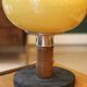 Mid-century vintage lamp — amber glass globe, 1960s