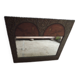 framed mirror with bird motif