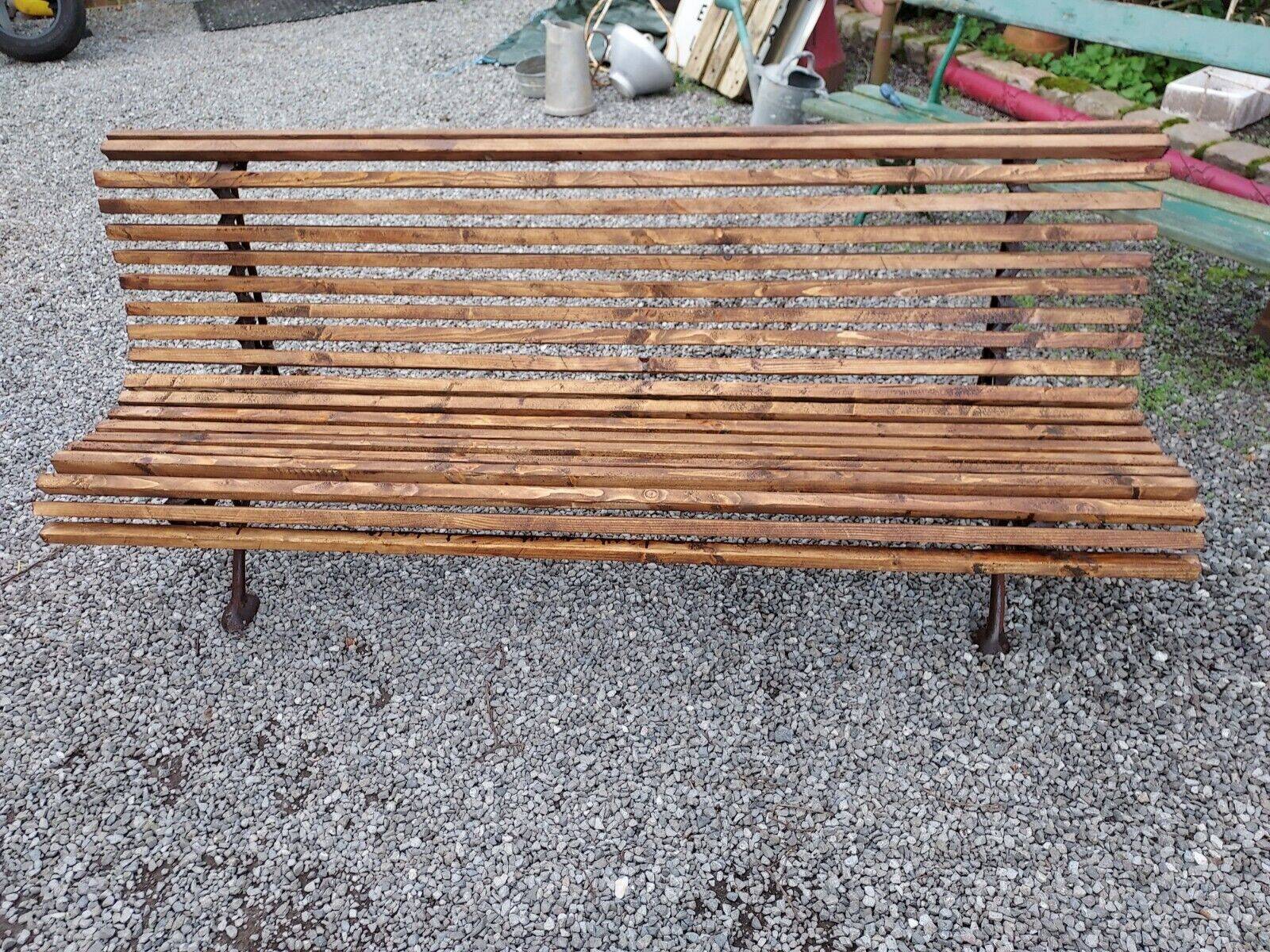 wooden garden bench with cast iron base