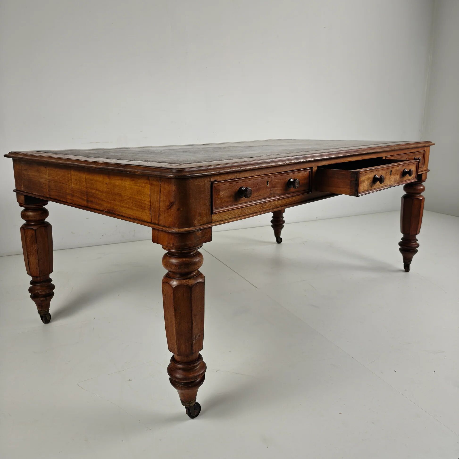 19th century English double-sided partner desk / writing table by S. & H. Jewell, A.