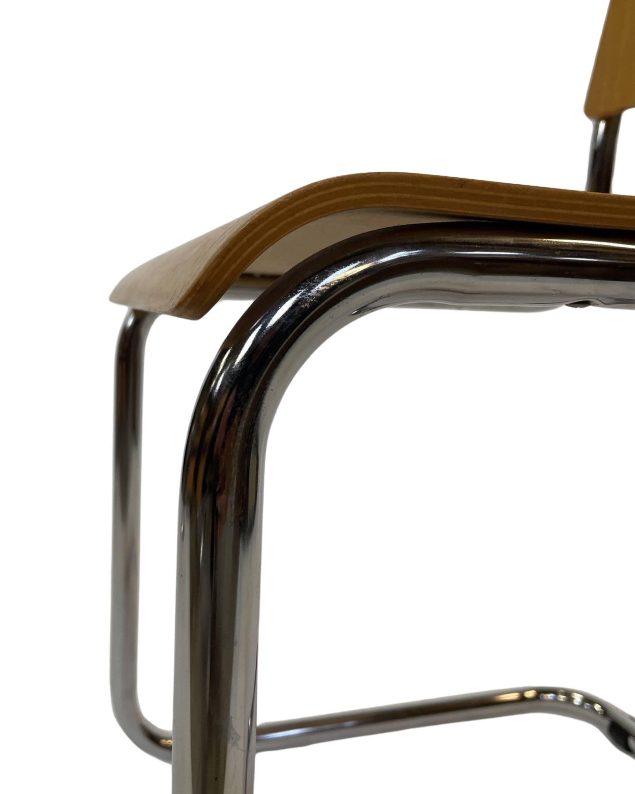 Set of four vintage dining room chairs, wood and chrome,  1970s