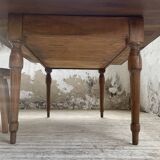 Walnut farmhouse table with swivel and extendable top