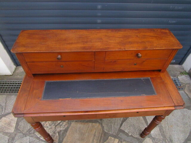 Old wooden stepped desk
