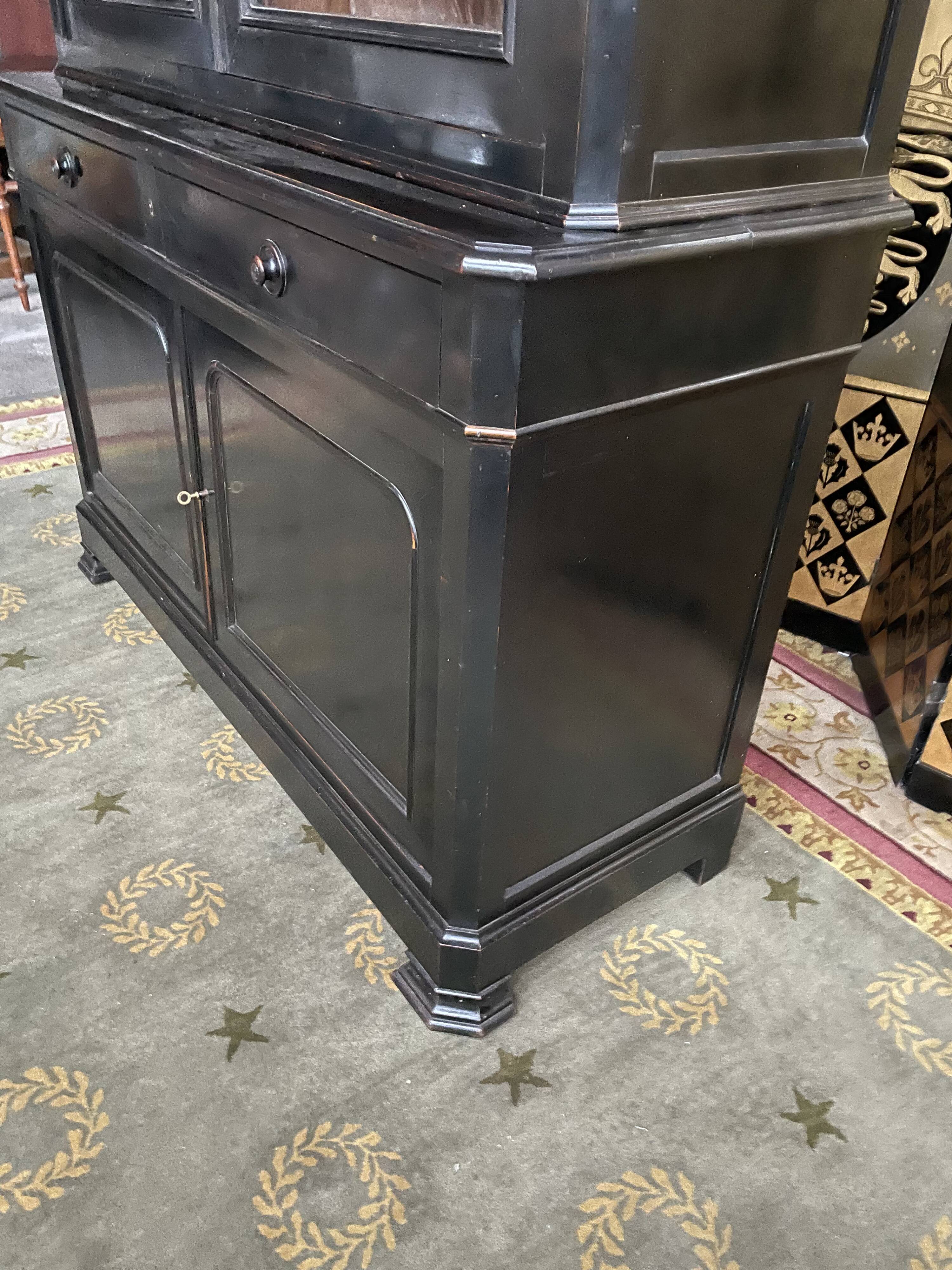 Louis Philippe two-body sideboard in blackened wood 19th