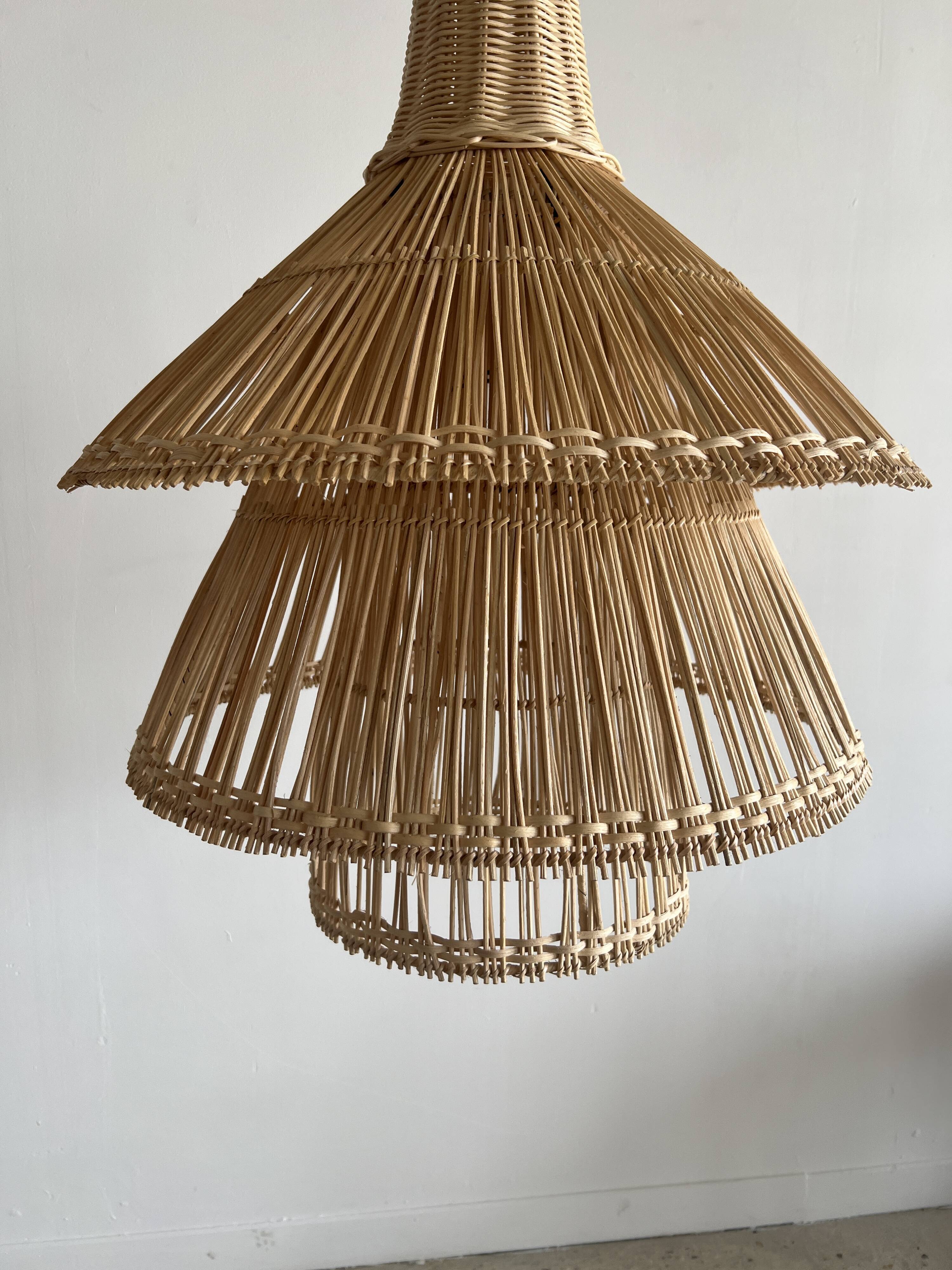 Rattan pendant lamp or light in the shape of an Asian lantern