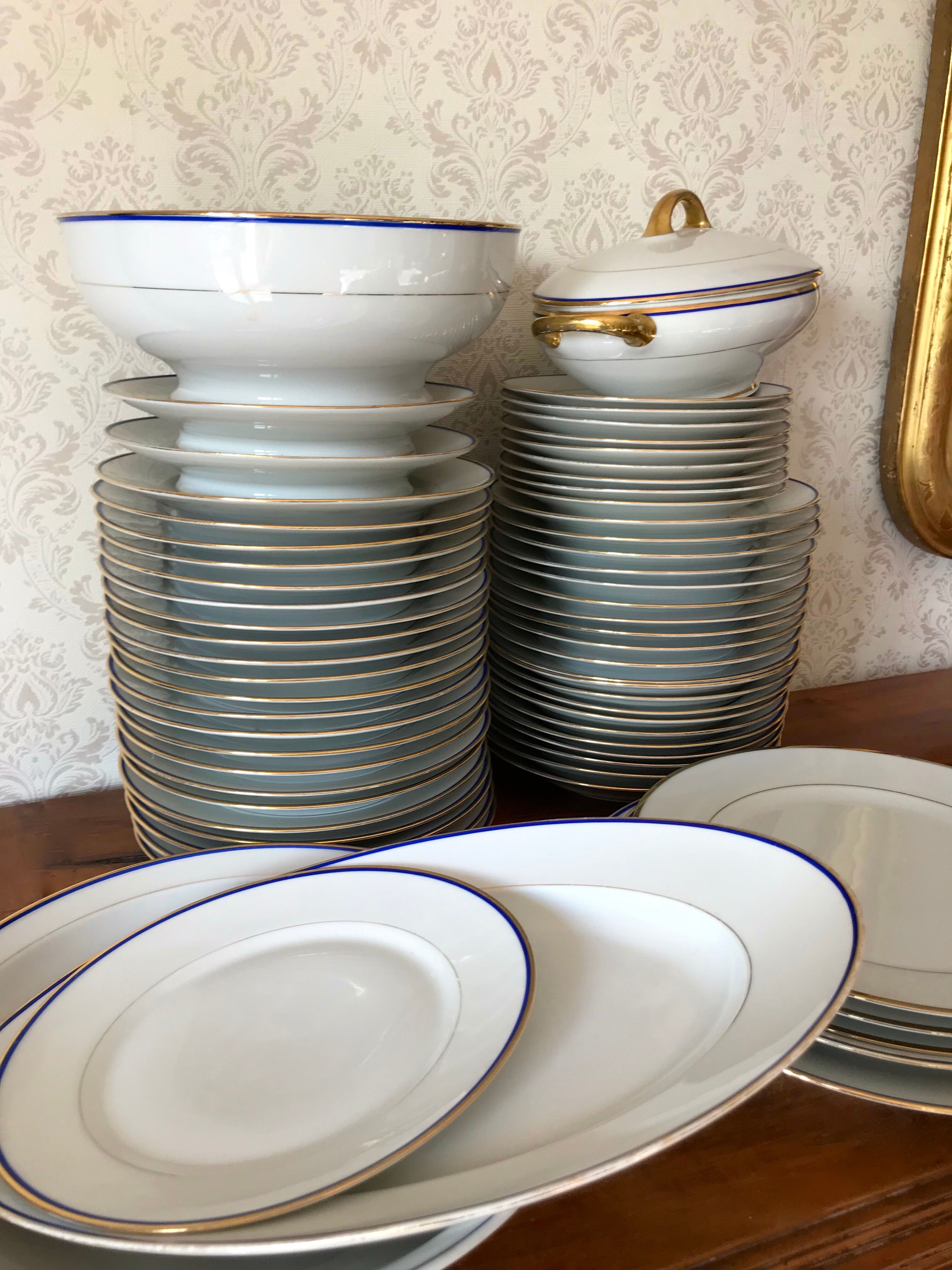 table service art deco limoges porcelain white border blue and gold 61 pieces signed