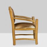 Brutalist style armchair in elm and goatskin, 1970s