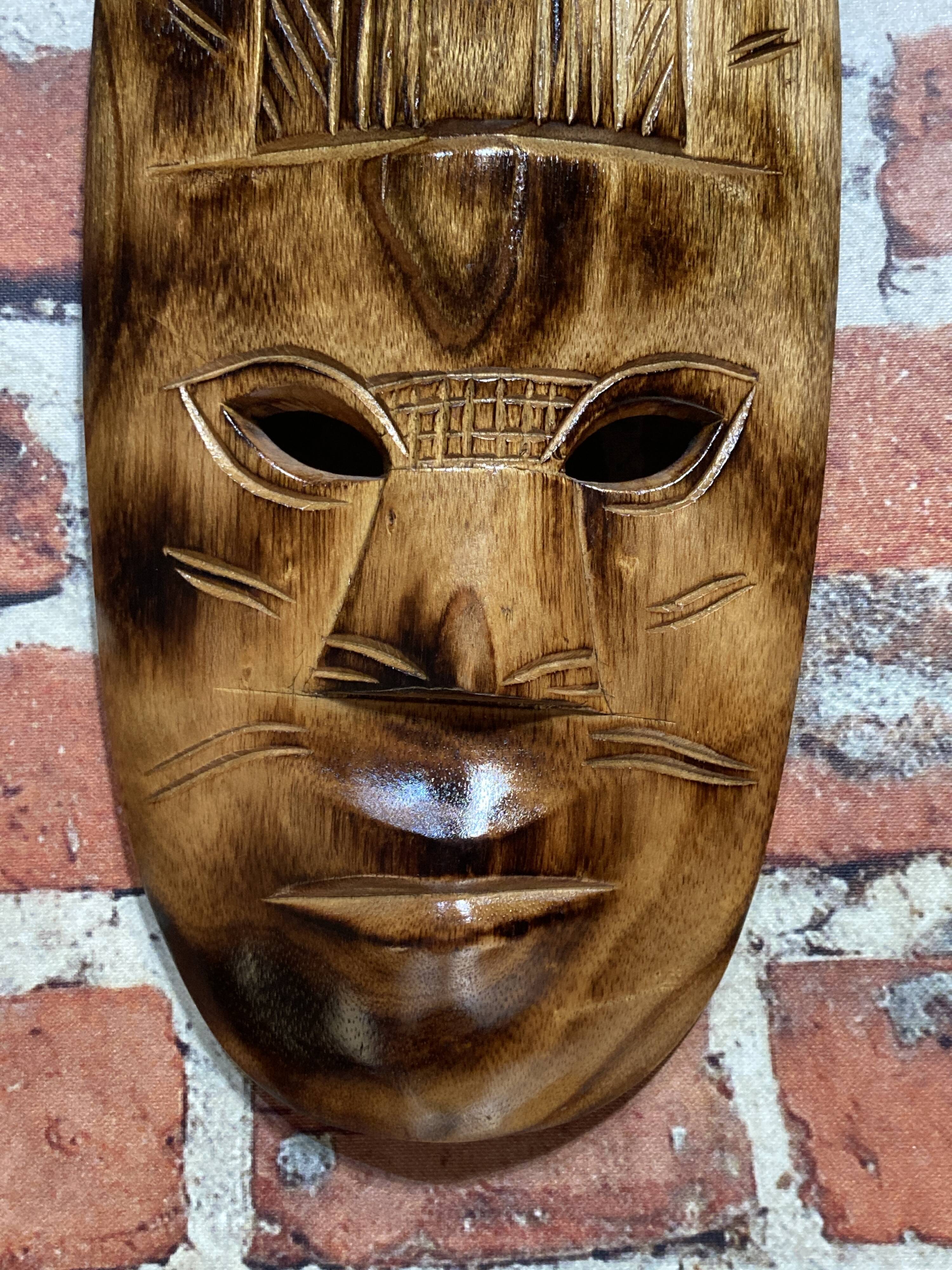 Wooden wall mask