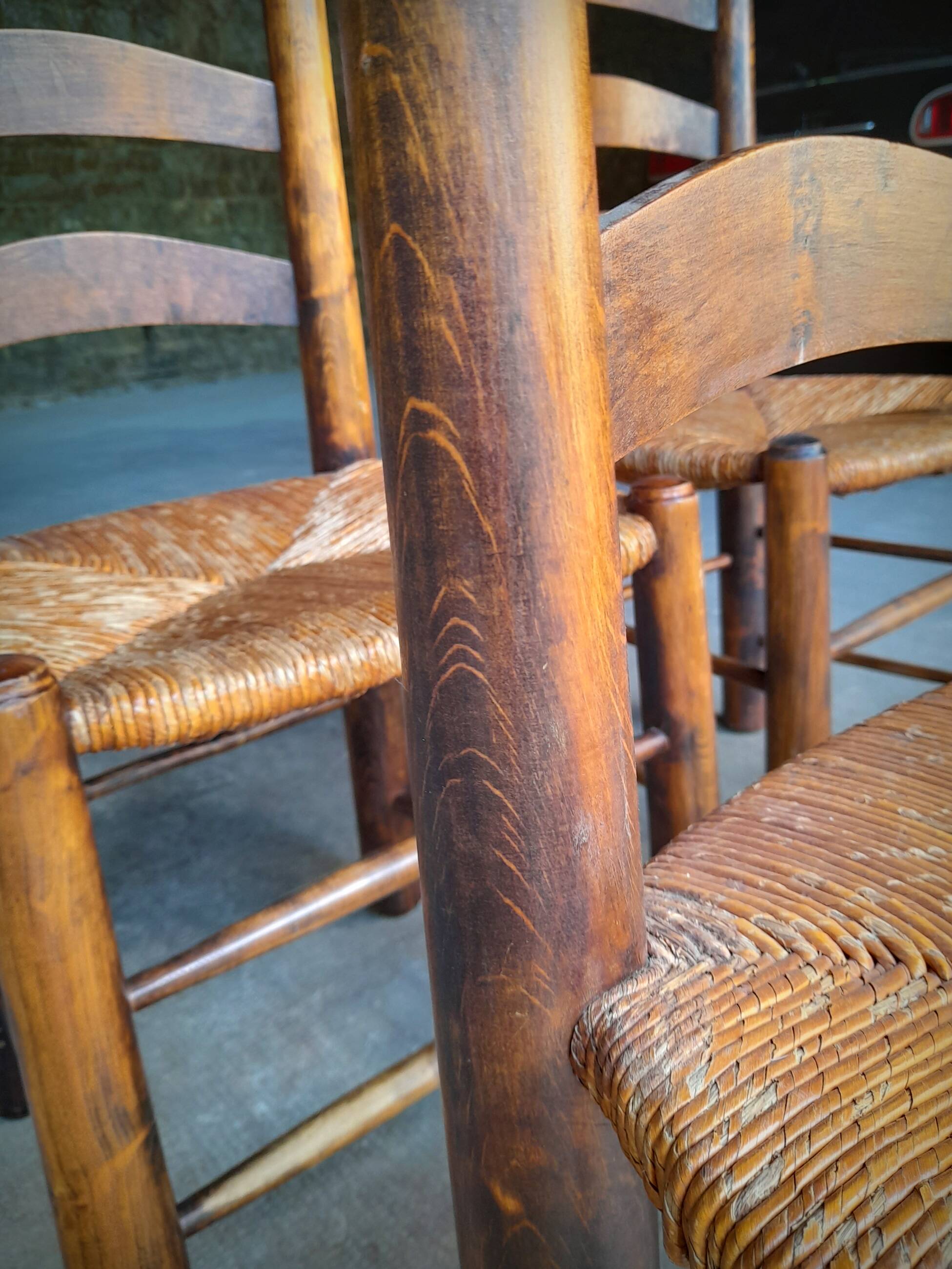 Set of 4 straw-covered brutalist chairs by George Robert