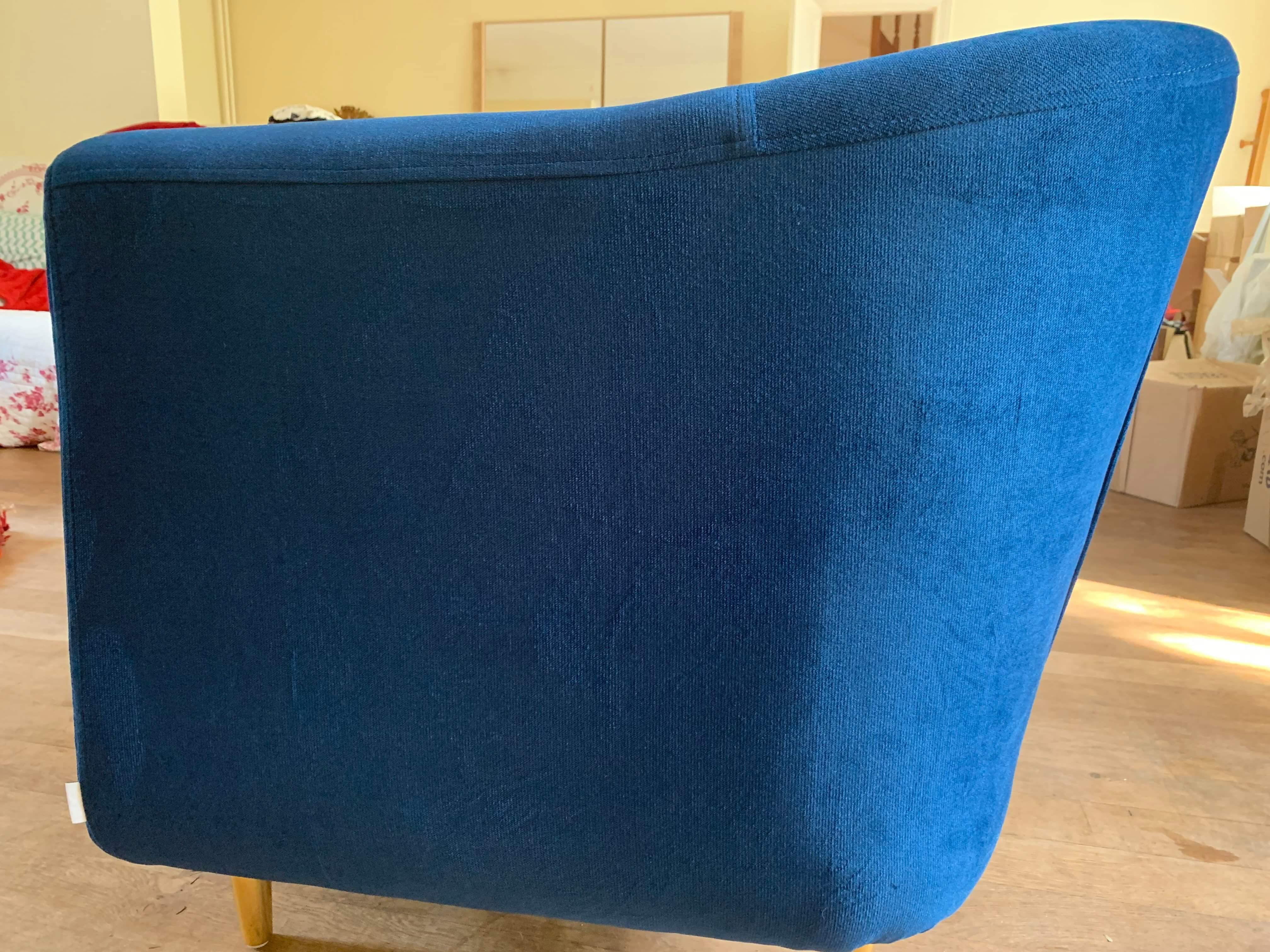 Blue velvet sofa