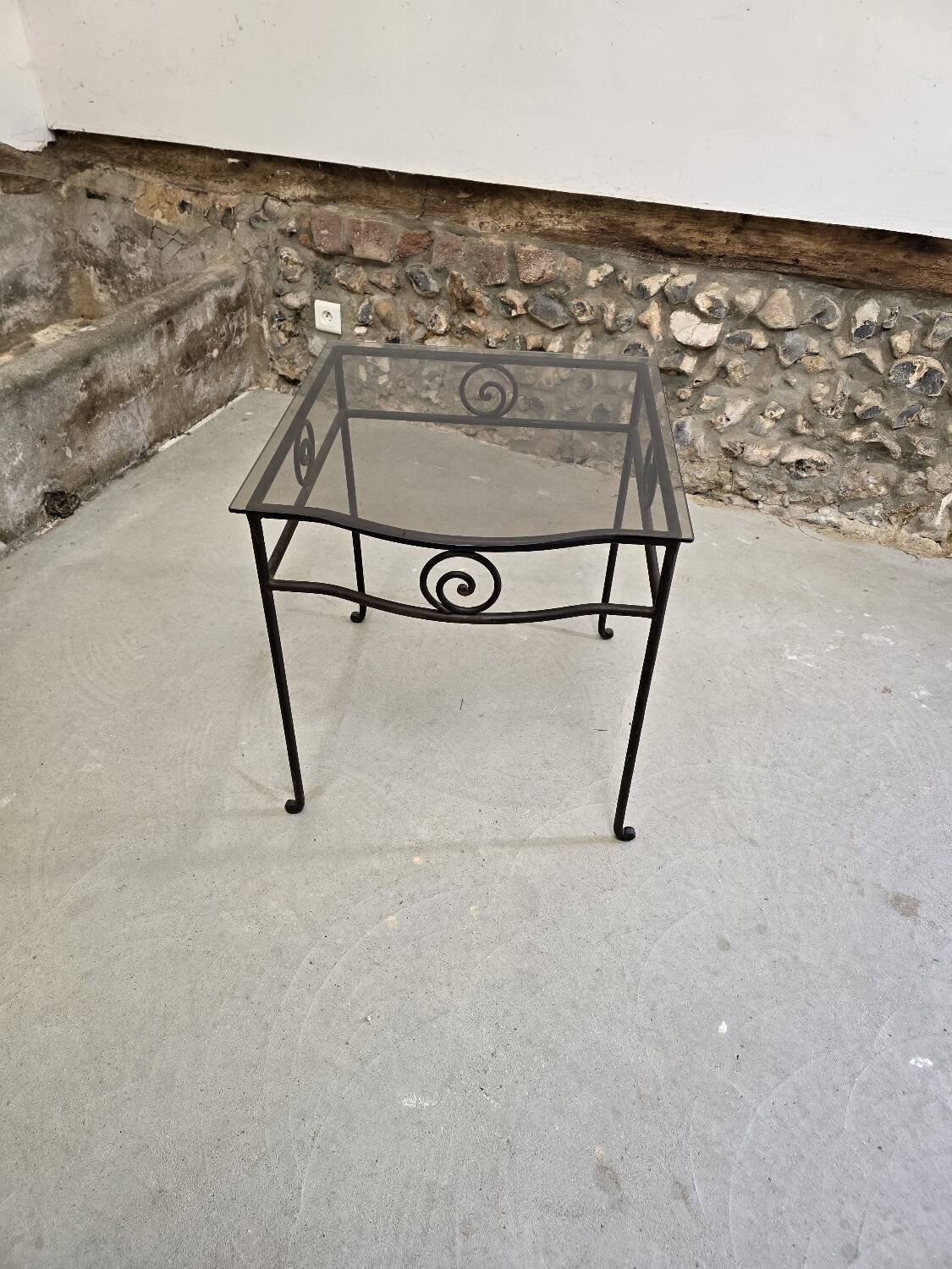 Small side table in wrought iron and smoked glass