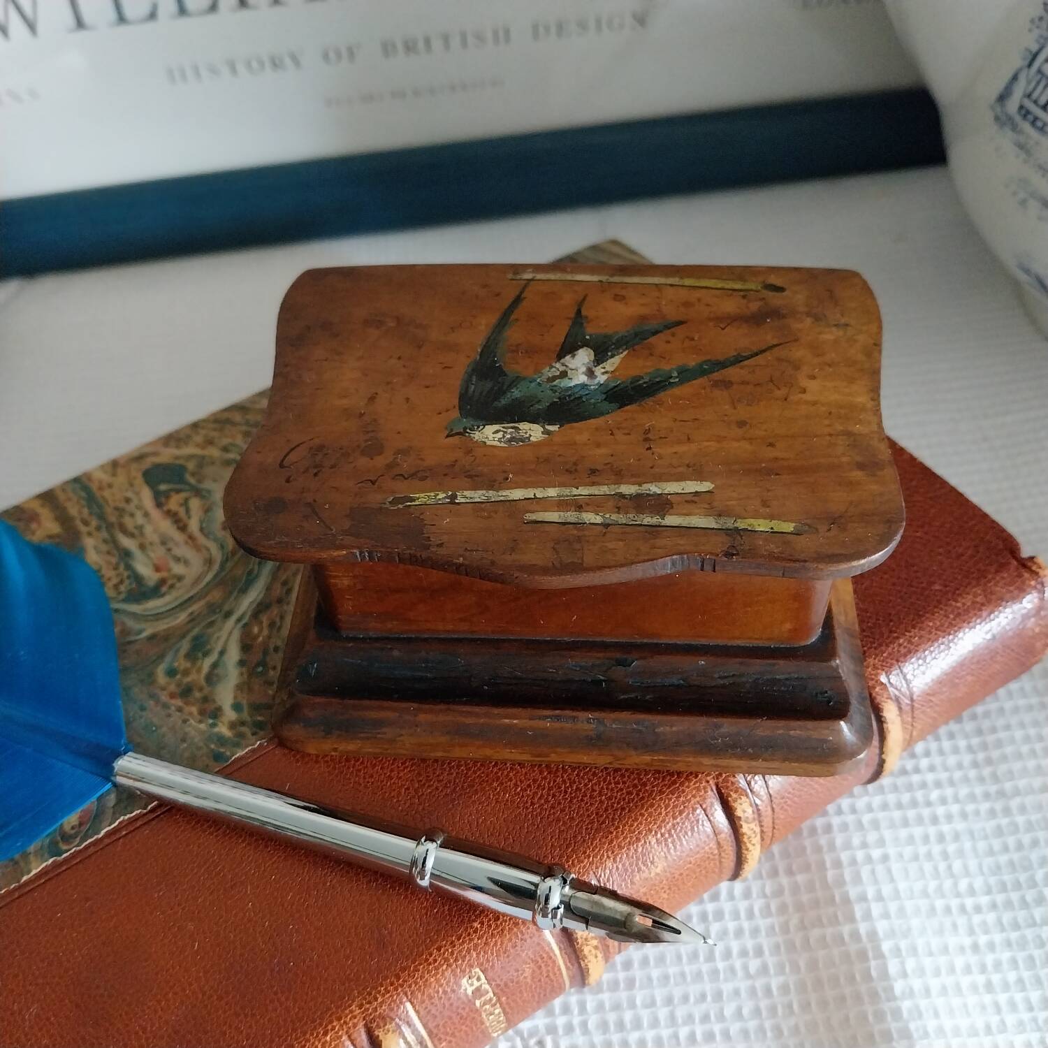 Old wooden feather box