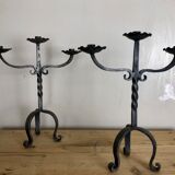 Pair of wrought iron candlesticks
