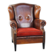 Sheepskin leather wingback chair with a red corduroy seat cushion