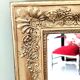 Wood and gilded stucco mirror, 19th century, 115 x 61.5 cm.