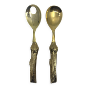 Lot of serving spoons, dessert spoon and fork in gold metal.
