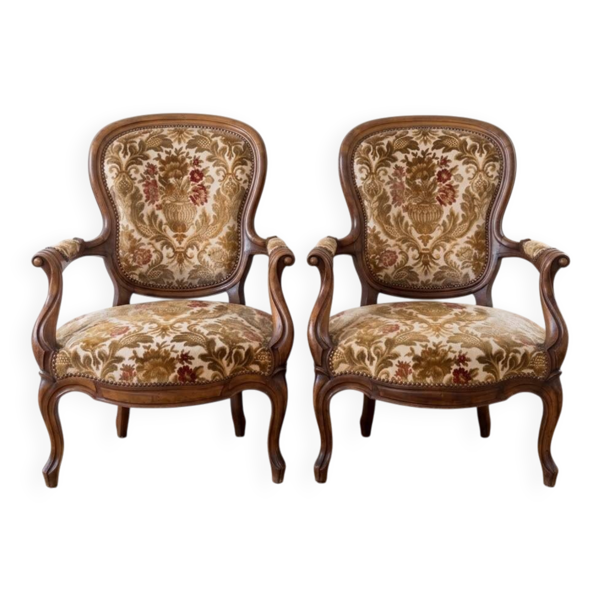 Pair of Louis XV armchairs in wood and floral fabric.