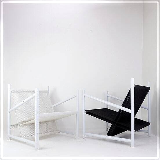 Indoor/Outdoor pair of Black/White Armchairs