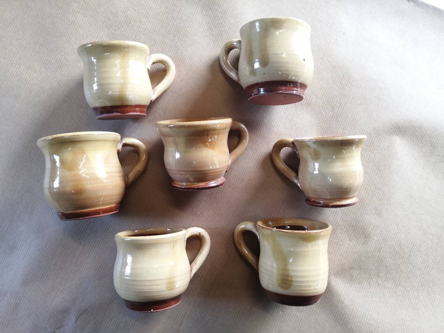 Set of 7 vintage stoneware yellow coffee cups