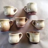 Set of 7 vintage stoneware yellow coffee cups