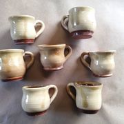 Set of 7 vintage stoneware yellow coffee cups