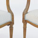 Paire de fauteuils cabriolets de style Louis XVI