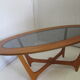 Oval teak coffee table