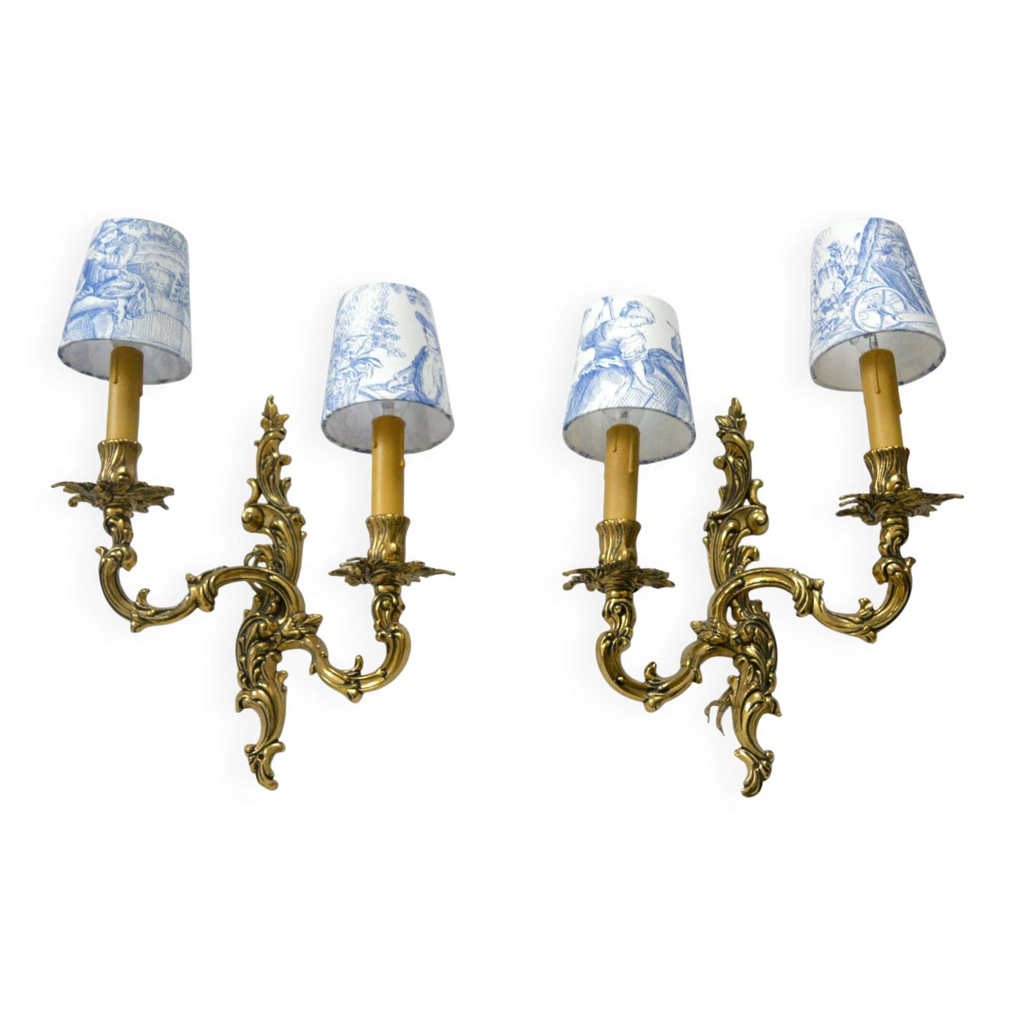 2 brass wall lights with toile de jouy lampshades