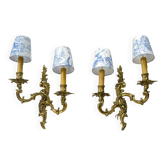 2 brass wall lights with toile de jouy lampshades