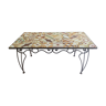 Wrought iron table and cement tile