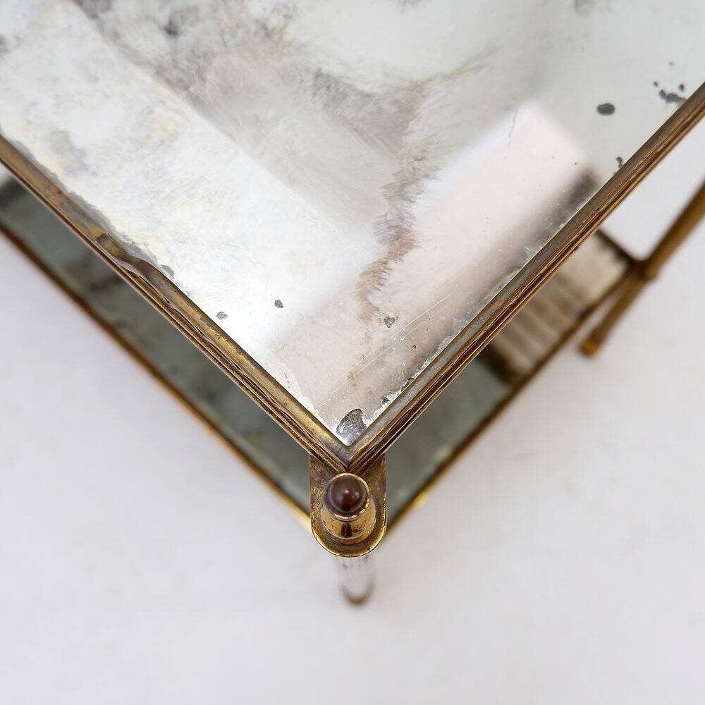 Two-tier side table with eglomisé mirror by Maison Jansen, French.