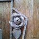Former Wall coat hangers painted in gray iron