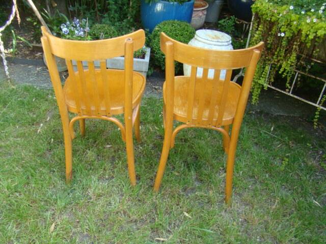 pair of St. Bauman chairs