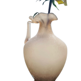 Old decorative carafe in li-colored glass