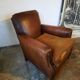 Old studded leather club chair 1930-1930