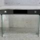 Modernist console, 1960s, glass base, wooden and fabric top.
