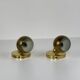 Pair of Guzzini brass spherical wall lights, 1970