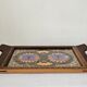 Wooden vintage plateau with butterfly decoration