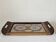 Wooden vintage plateau with butterfly decoration