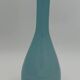 Blue lined glass bottle vase