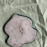 Two dishes empty pocket slurry, biscuits in the shape of vintage green leaf