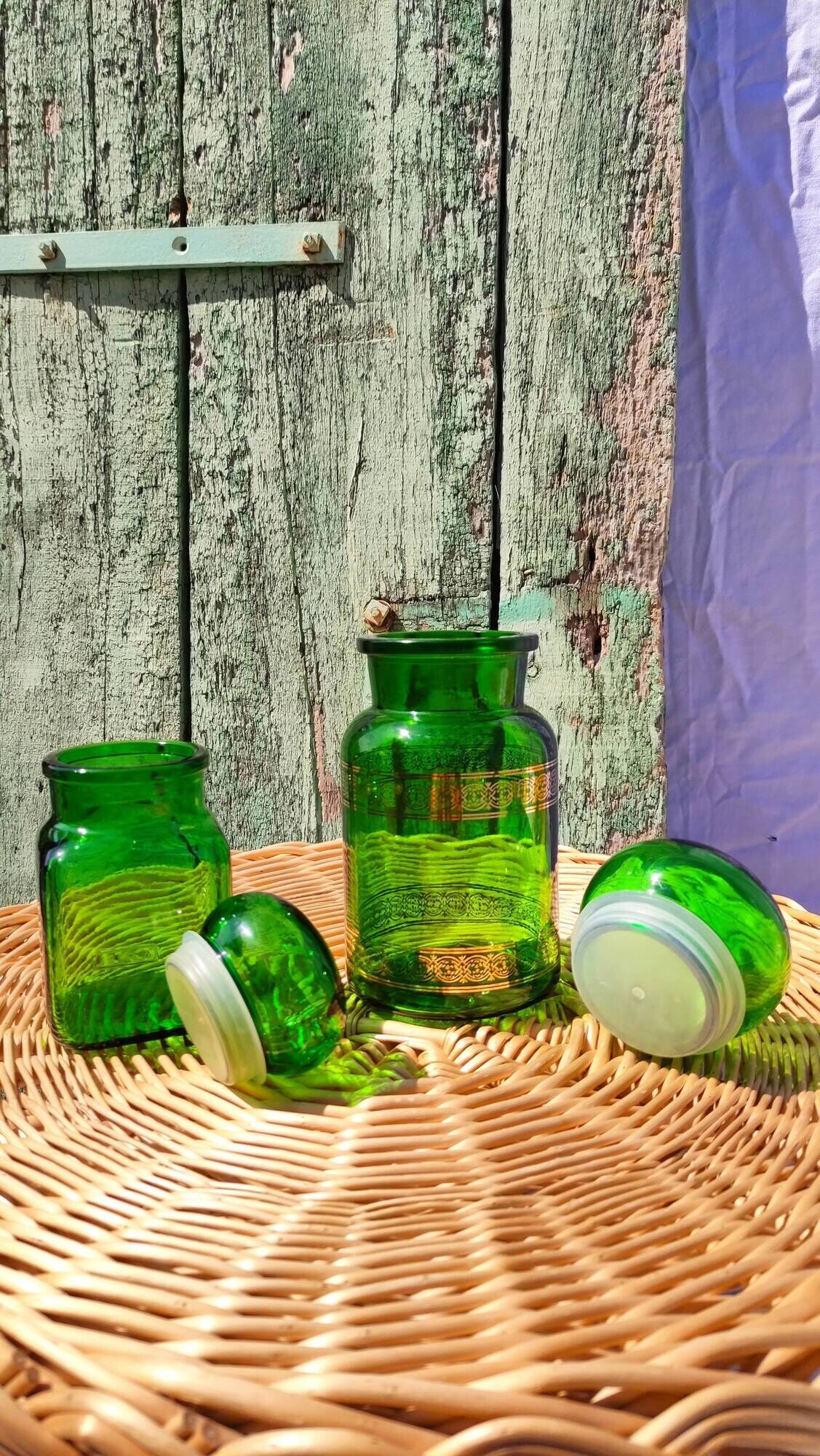 Duo of pots and jars apothecary style in green glass.